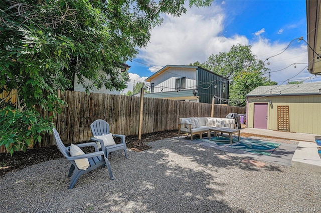 2831 N Humboldt St, Denver, CO 80205 - fenced backyard with a patio area and an outdoor hangout area