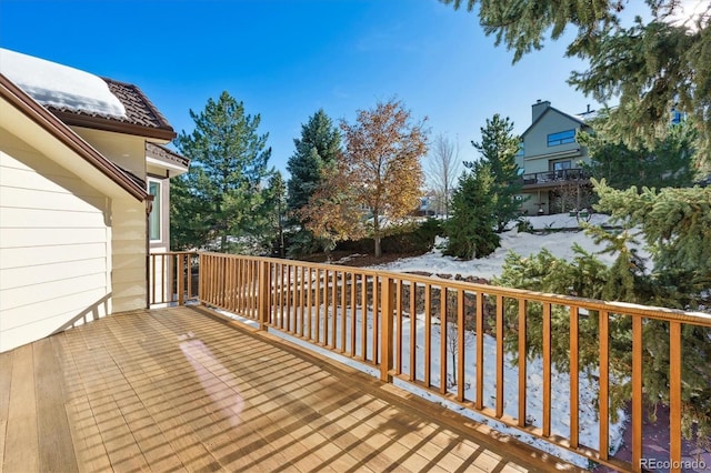 view of snow covered deck