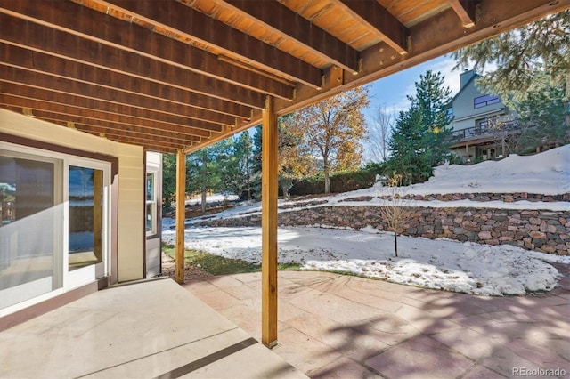 view of snow covered patio