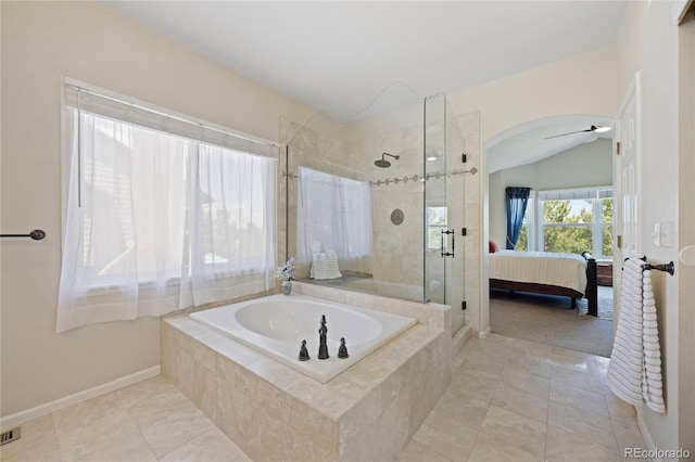 10 Sand Cherry, Littleton, CO 80127 - ensuite bathroom with a garden tub, lofted ceiling, a stall shower, tile patterned flooring, and ceiling fan