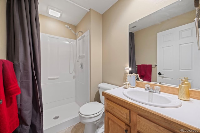 10 Sand Cherry, Littleton, CO 80127 - bathroom with a shower stall, toilet, and vanity
