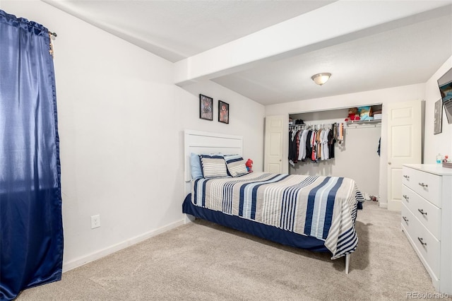 933 W Independent Ave, La Salle, CO 80645 - bedroom with baseboards, light colored carpet, and a closet
