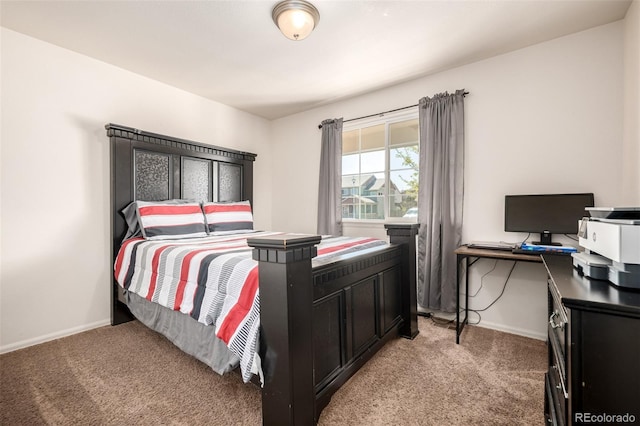 933 W Independent Ave, La Salle, CO 80645 - bedroom with baseboards and light carpet