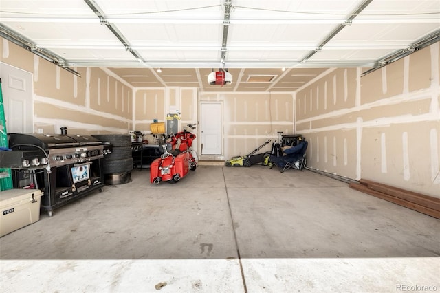 933 W Independent Ave, La Salle, CO 80645 - garage featuring a garage door opener