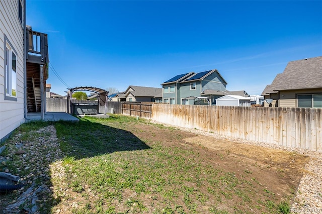933 W Independent Ave, La Salle, CO 80645 - view of yard featuring a residential view and a fenced backyard