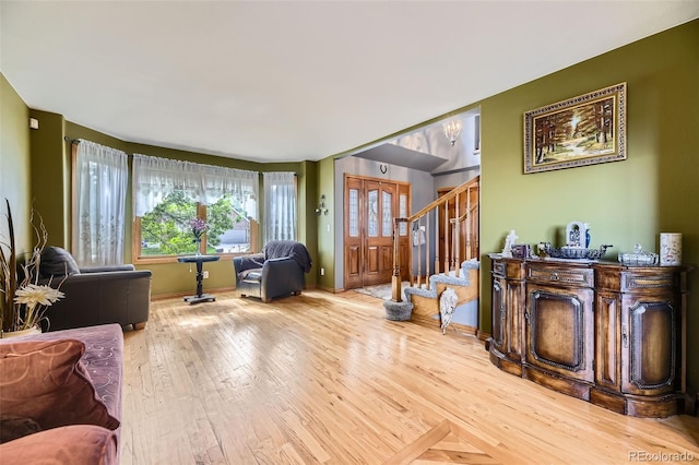 6588 S Oak Cir, Littleton, CO 80127 - living area featuring stairs and hardwood / wood-style floors