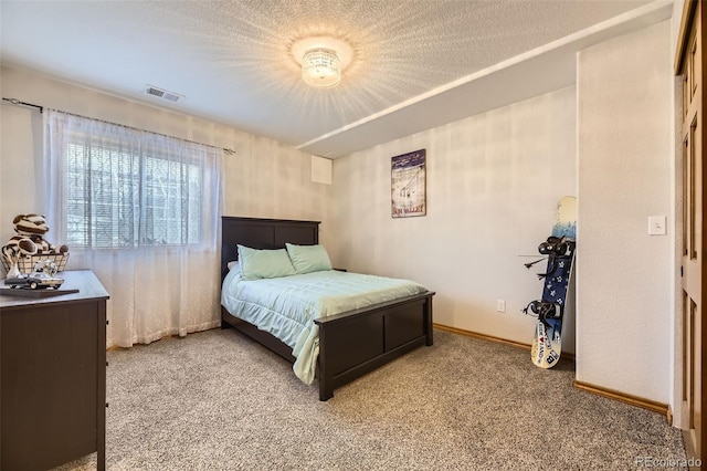 6588 S Oak Cir, Littleton, CO 80127 - bedroom with carpet floors and a textured ceiling