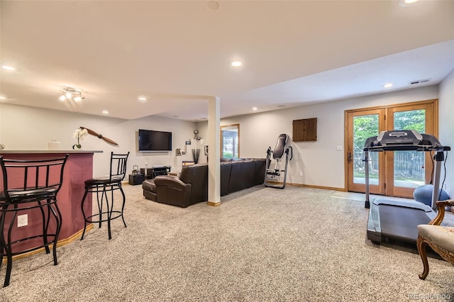 6588 S Oak Cir, Littleton, CO 80127 - living room featuring light carpet, a bar, and recessed lighting