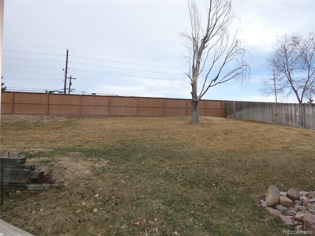 view of yard with fence