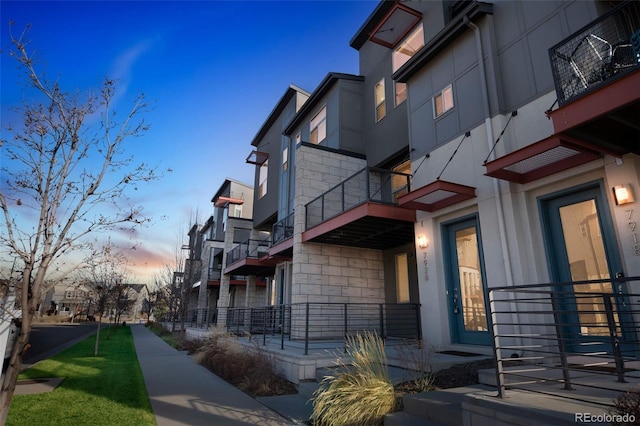 view of property at dusk