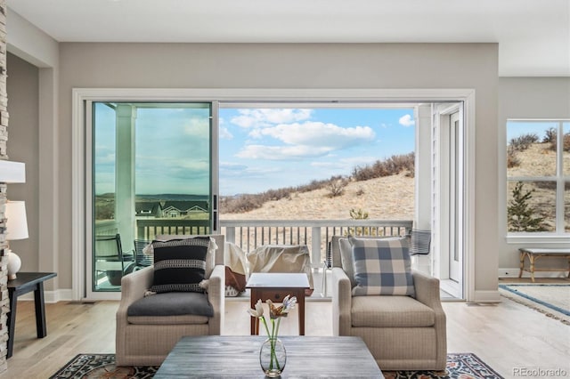 sunroom / solarium with a healthy amount of sunlight