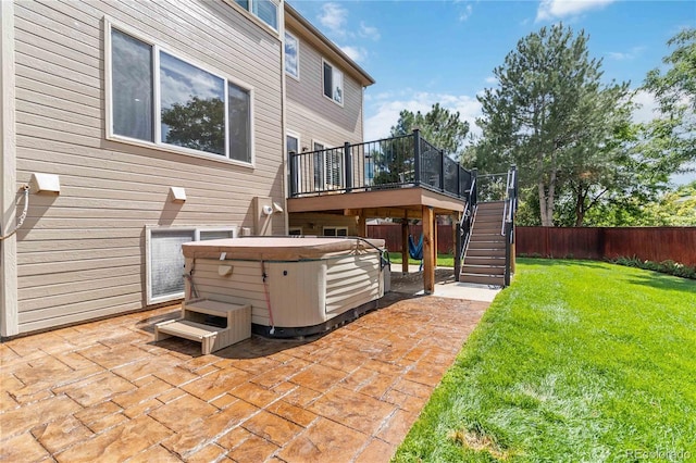 9169 Fox Fire Way, Highlands Ranch, CO 80129 - view of patio / terrace with a hot tub, stairs, and a deck