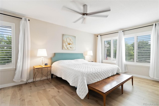 9169 Fox Fire Way, Highlands Ranch, CO 80129 - bedroom featuring light wood finished floors, baseboards, and a ceiling fan
