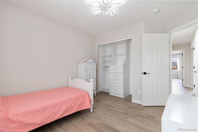 9169 Fox Fire Way, Highlands Ranch, CO 80129 - bedroom with light wood-style flooring
