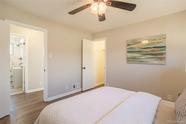 bedroom featuring visible vents, connected bathroom, baseboards, wood finished floors, and a ceiling fan