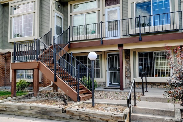 1885 S Quebec Way Unit A16, Denver, CO 80231 - entrance to property with stone siding