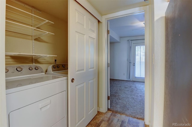 1885 S Quebec Way Unit A16, Denver, CO 80231 - laundry area with independent washer and dryer and light wood-style floors