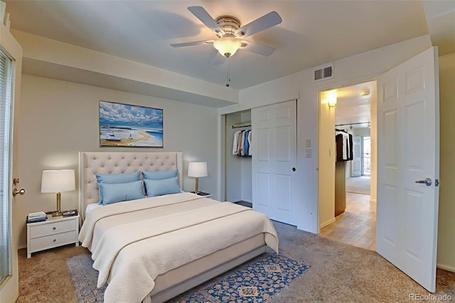 1885 S Quebec Way Unit A16, Denver, CO 80231 - bedroom with carpet flooring, a closet, and ceiling fan