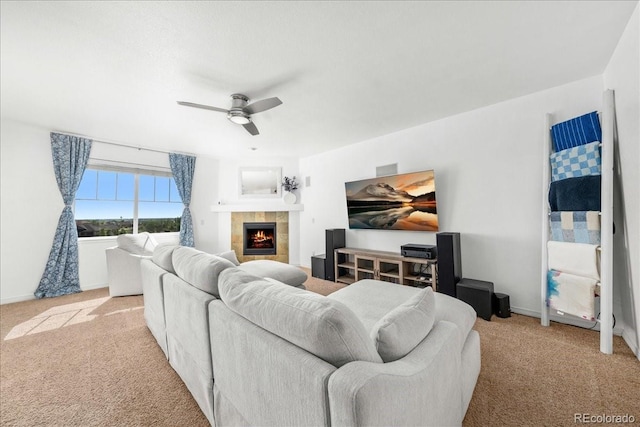 12972 Uinta Ct, Thornton, CO 80602 - living room with light colored carpet, a ceiling fan, baseboards, and a tile fireplace