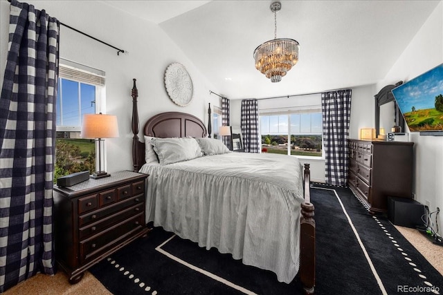 12972 Uinta Ct, Thornton, CO 80602 - bedroom with dark carpet, a chandelier, and vaulted ceiling