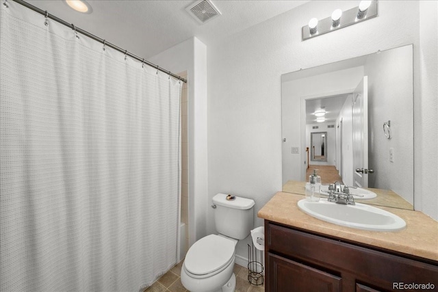 12972 Uinta Ct, Thornton, CO 80602 - full bathroom featuring vanity, toilet, shower / tub combo with curtain, and tile patterned flooring