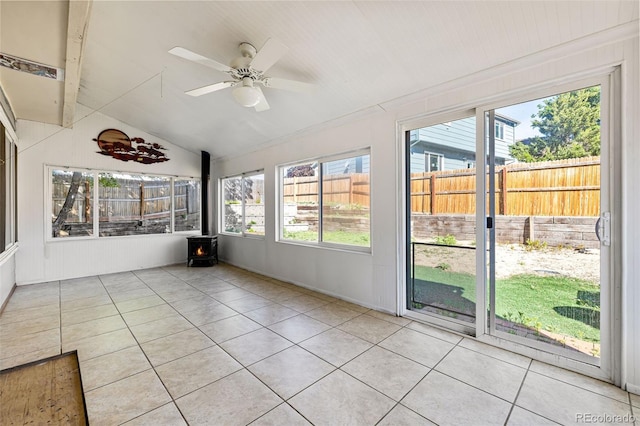 9805 Garrison Ct, Broomfield, CO 80021 - unfurnished sunroom with a wood stove, ceiling fan, and vaulted ceiling