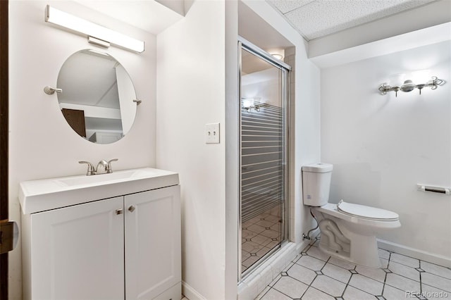 9805 Garrison Ct, Broomfield, CO 80021 - full bath featuring a shower stall, vanity, toilet, baseboards, and tile patterned floors