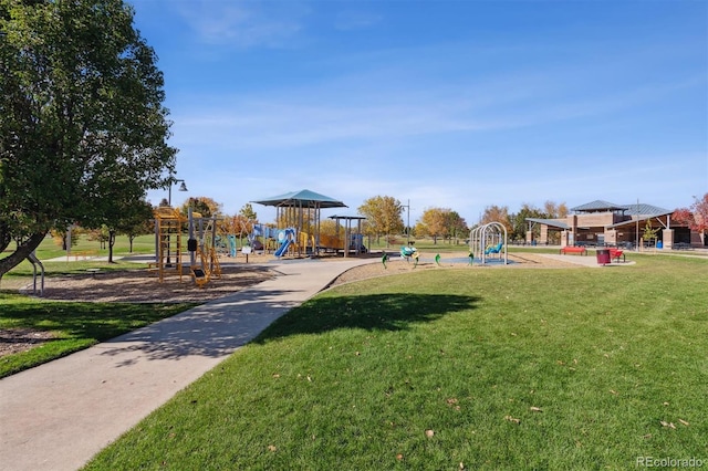 view of play area featuring a lawn