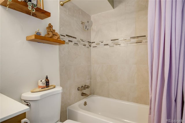 full bath with toilet, shower / bath combo with shower curtain, and vanity