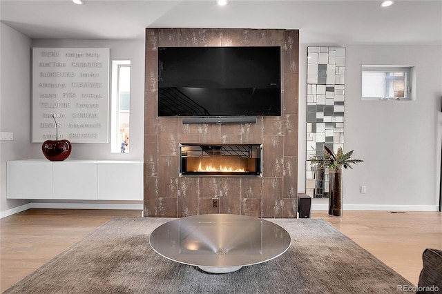 4156 Vrain St, Denver, CO 80212 - living room with wood finished floors, recessed lighting, and a fireplace