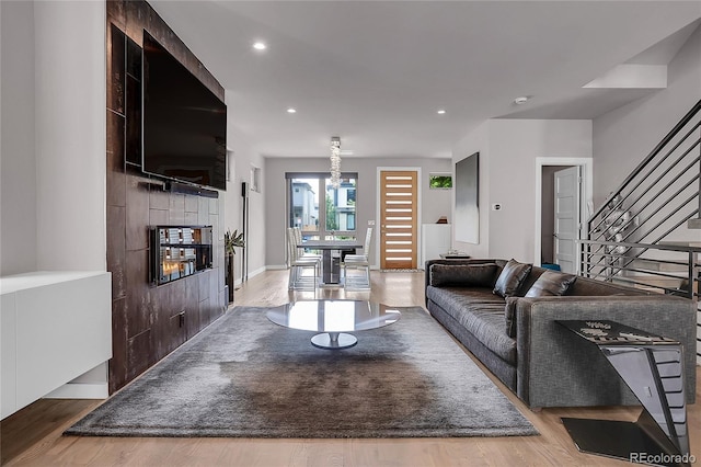 4156 Vrain St, Denver, CO 80212 - living area featuring wood finished floors, recessed lighting, and stairs