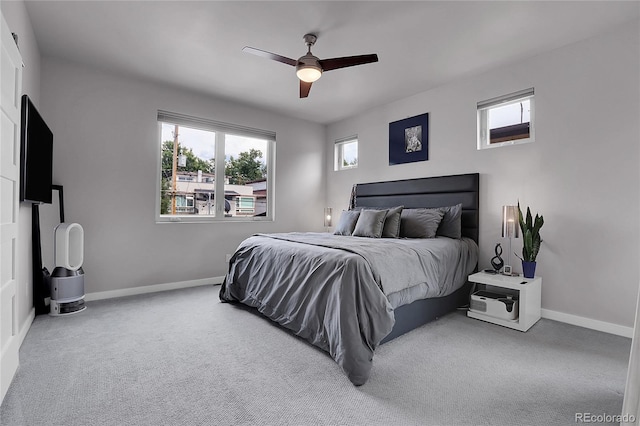 4156 Vrain St, Denver, CO 80212 - carpeted bedroom with multiple windows and a ceiling fan