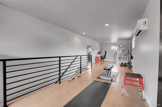 4156 Vrain St, Denver, CO 80212 - workout area featuring a wall mounted AC, wood finished floors, and recessed lighting