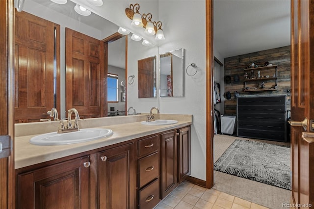 full bathroom with tile patterned floors and double vanity