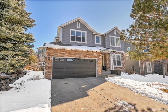 view of front of home with a garage