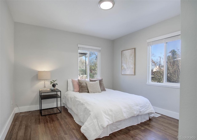 bedroom featuring dark hardwood / wood-style floors