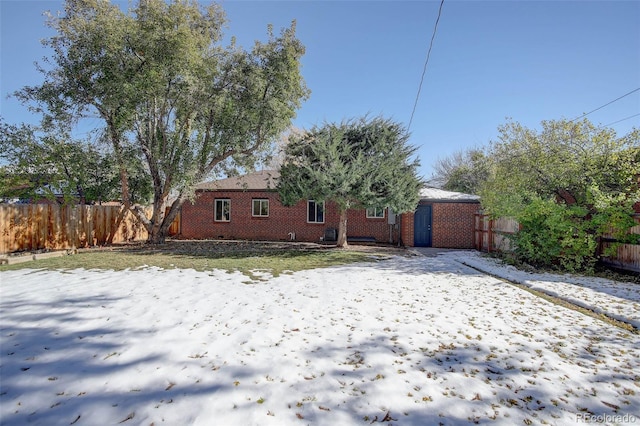 view of snow covered property