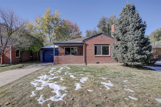 single story home featuring a front yard and a garage