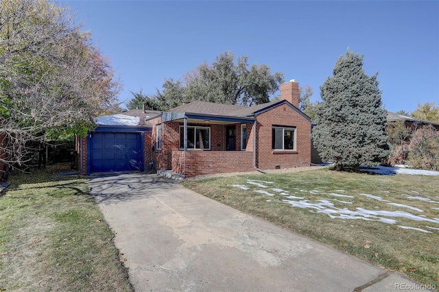 ranch-style home with a front yard and a garage