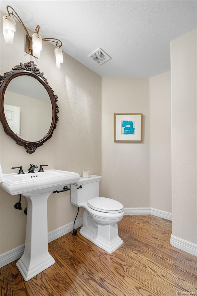 11 Canon Pl, Greenwood Village, CO 80111 - half bathroom with wood finished floors