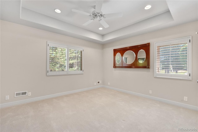 11 Canon Pl, Greenwood Village, CO 80111 - unfurnished room featuring a raised ceiling, carpet flooring, healthy amount of natural light, and recessed lighting