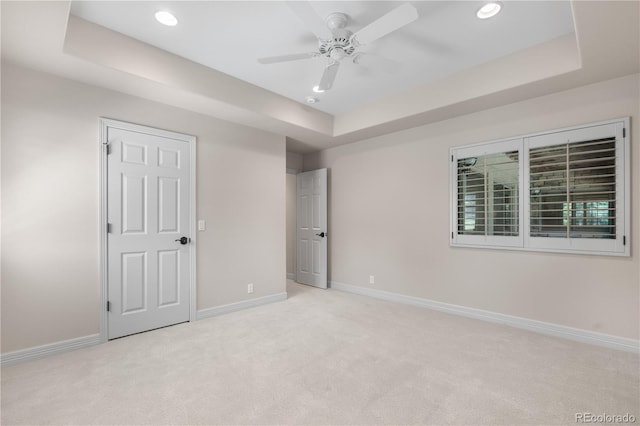 11 Canon Pl, Greenwood Village, CO 80111 - unfurnished bedroom with a raised ceiling, carpet floors, recessed lighting, and a ceiling fan
