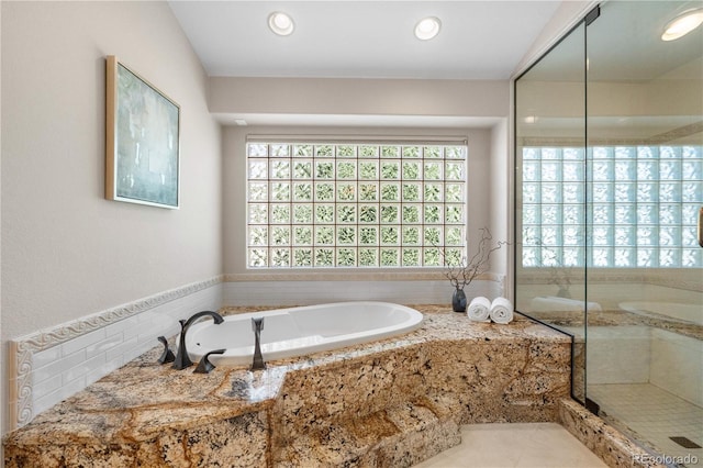 11 Canon Pl, Greenwood Village, CO 80111 - bathroom featuring a garden tub, a shower stall, tile patterned floors, and recessed lighting