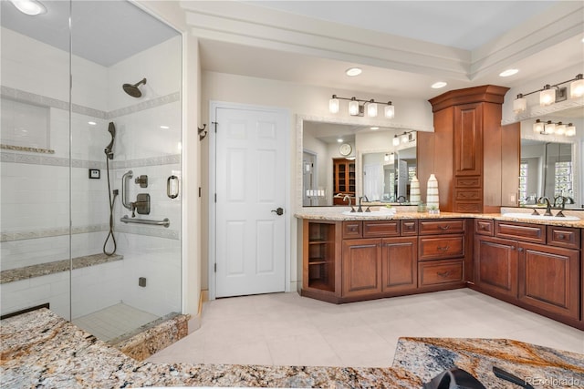 11 Canon Pl, Greenwood Village, CO 80111 - bathroom with a shower stall, double vanity, and recessed lighting