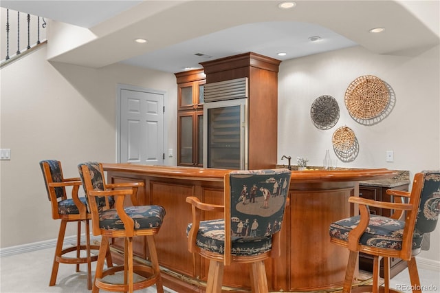 11 Canon Pl, Greenwood Village, CO 80111 - indoor wet bar featuring beverage cooler, recessed lighting, and carpet