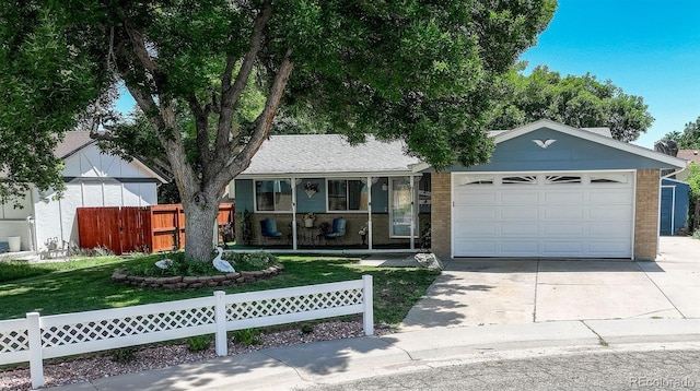 6416 Zang Ct, Arvada, CO 80004 - single story home with driveway, a garage, and brick siding