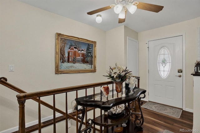 6416 Zang Ct, Arvada, CO 80004 - foyer entrance featuring dark wood-style flooring and ceiling fan