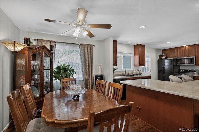 6416 Zang Ct, Arvada, CO 80004 - dining space with ceiling fan, dark wood-type flooring, and recessed lighting
