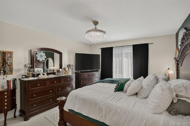 6416 Zang Ct, Arvada, CO 80004 - bedroom with light carpet and a chandelier