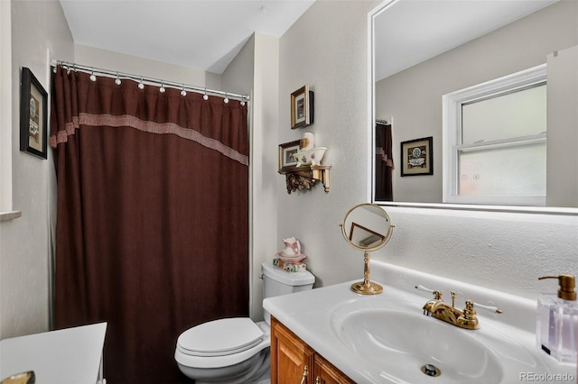 6416 Zang Ct, Arvada, CO 80004 - bathroom with vanity and a shower with curtain